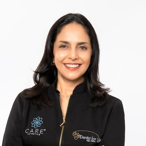 Dr. Saba Rizvi, dentist at Plantation dental practice, smiling in professional portrait.